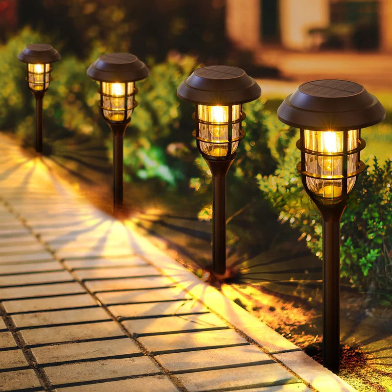 Lampara Solar Para Césped Tipo Estaca LED. (Pack De 8) Lampara Negra Con Panel Solar Integrado. Para Jardín. (Luz Cálida). Foco TU058 Selecto