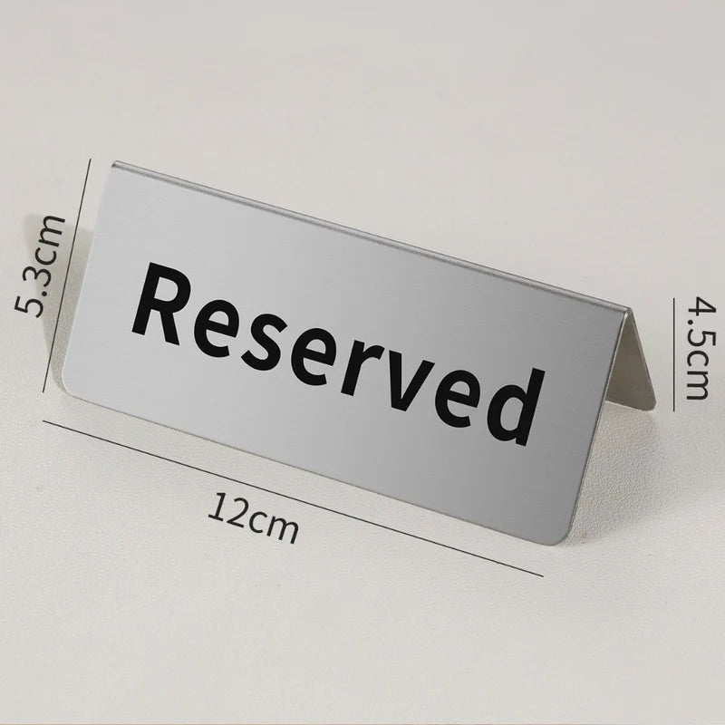 Letrero De Mesa De Reservas “Reserved” De 12 Cm. Señalización De Reservado De Acero Inoxidable Para Restaurante Y Eventos. Color Plateado. LT914
